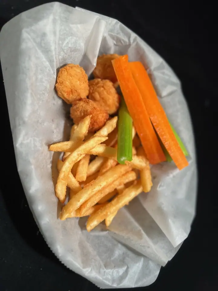I Don't Want That: boneless chicken bites with fries, carrot sticks and celery.